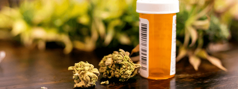 Recreational Marijuana in Piles By Medicine Bottle