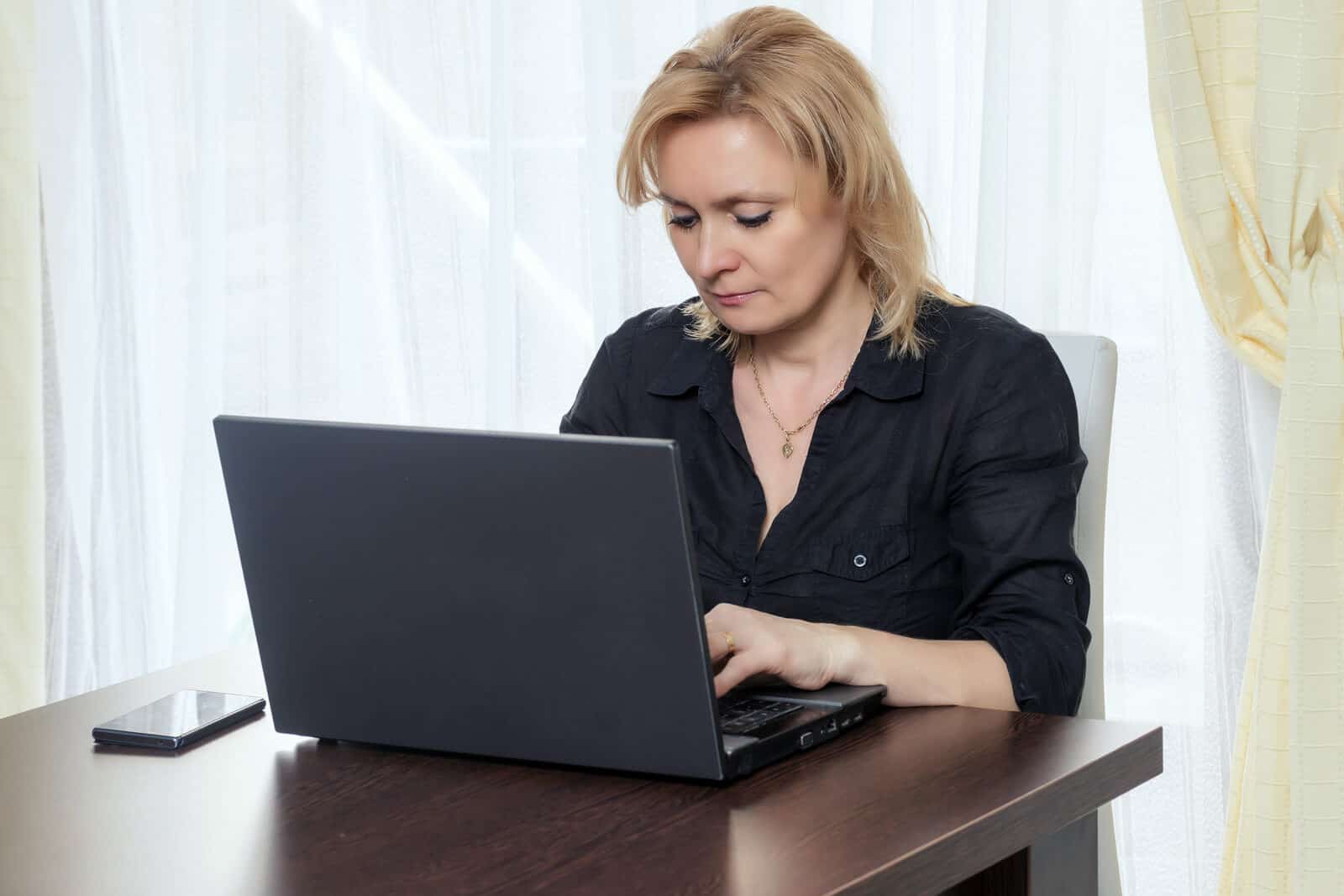 Woman Working on Laptop