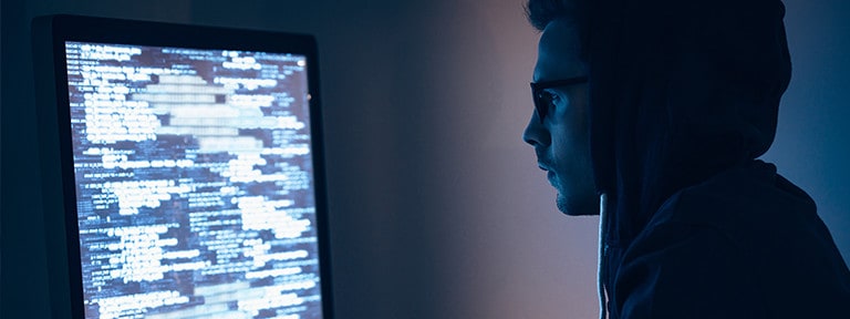 Cybersecurity - Hacker Working on Computer